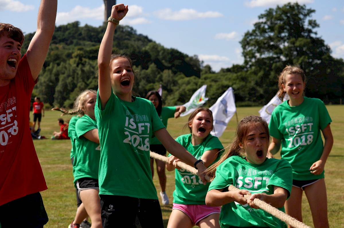 students at summer school tug of war event