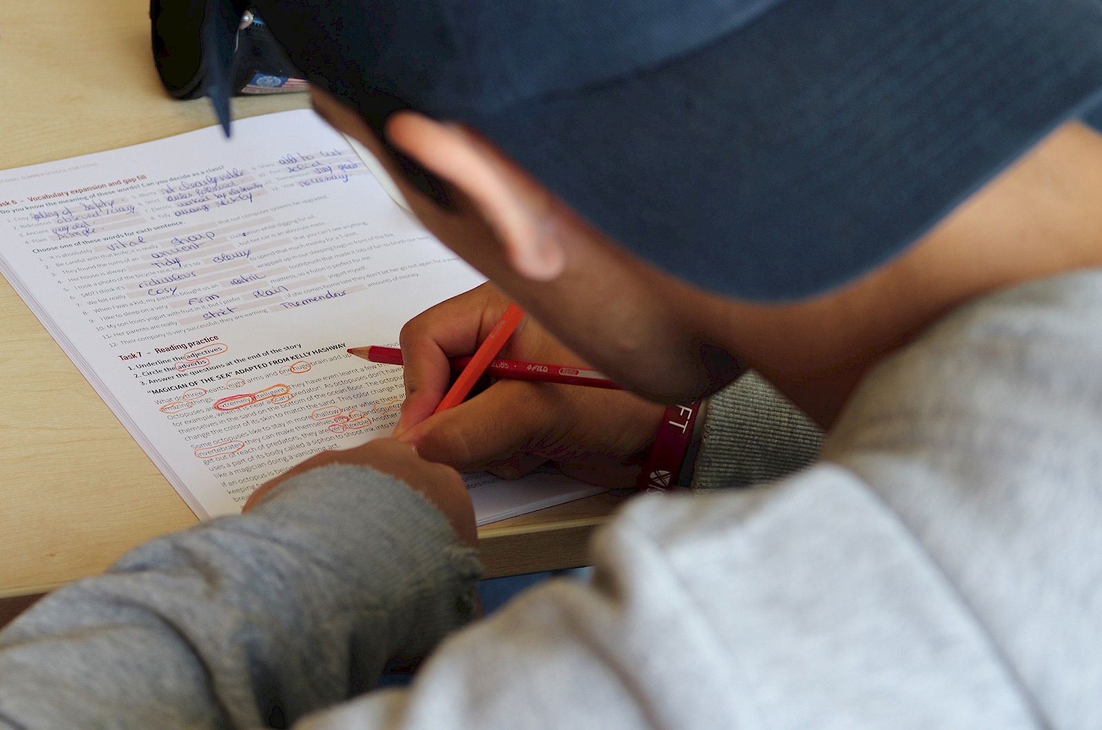 Student practicing essay writing technique