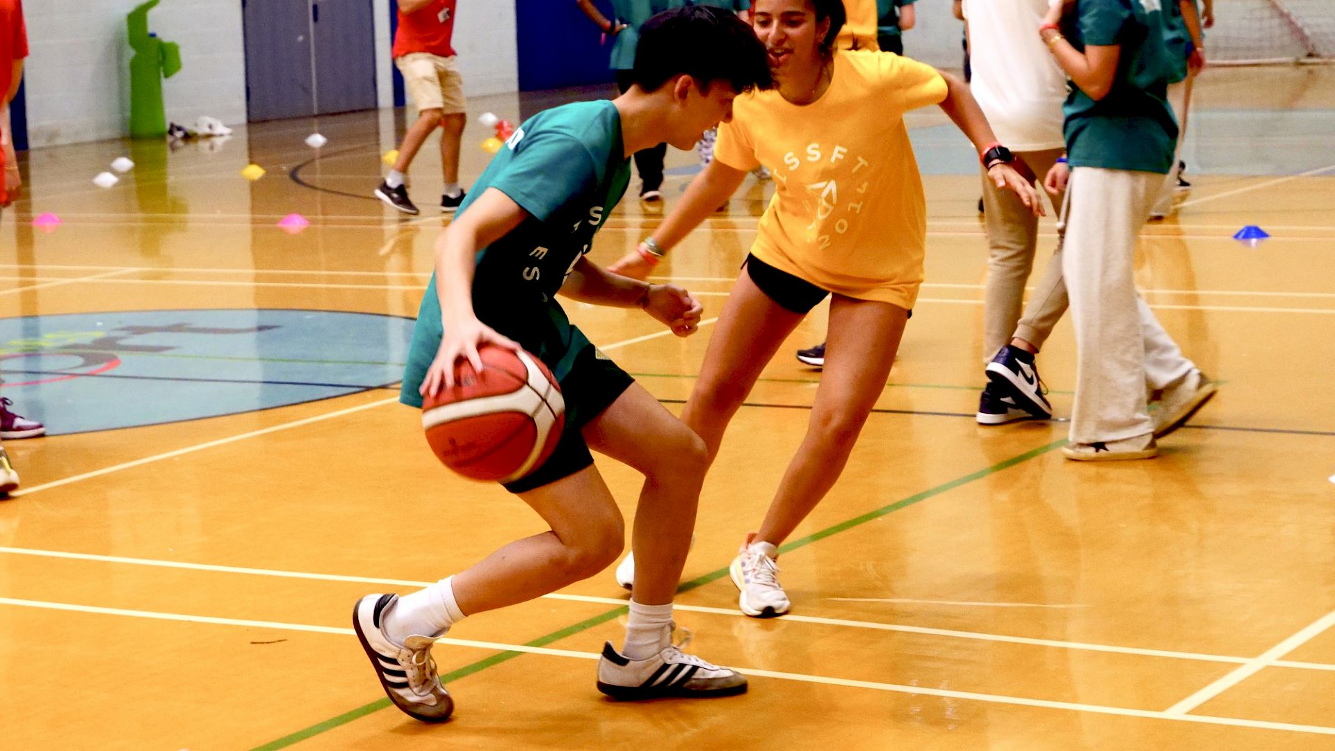 ISSFT students playing basketball