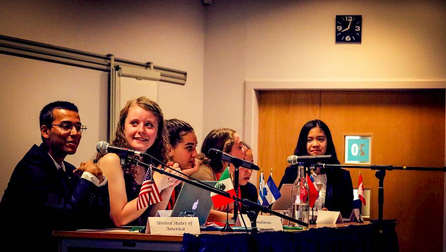 ISSFT students taking part in a Model United Nations session, delivering speeches and negotiating resolutions in a global leadership setting.