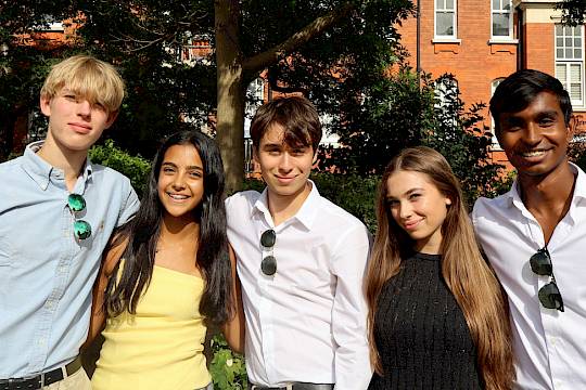 International teenagers from different countries speaking English together at ISSFT summer school.