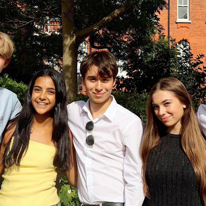 International teenagers from different countries speaking English together at ISSFT summer school.