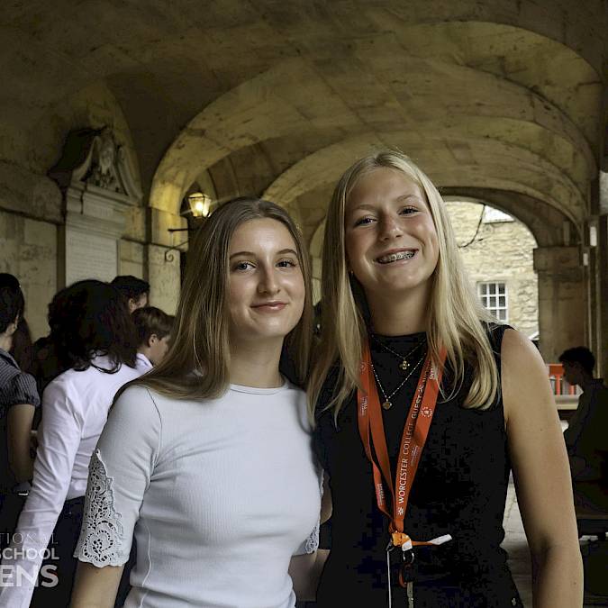 two teenage girls standing in the worcester college cloisters, issft summer school 2026